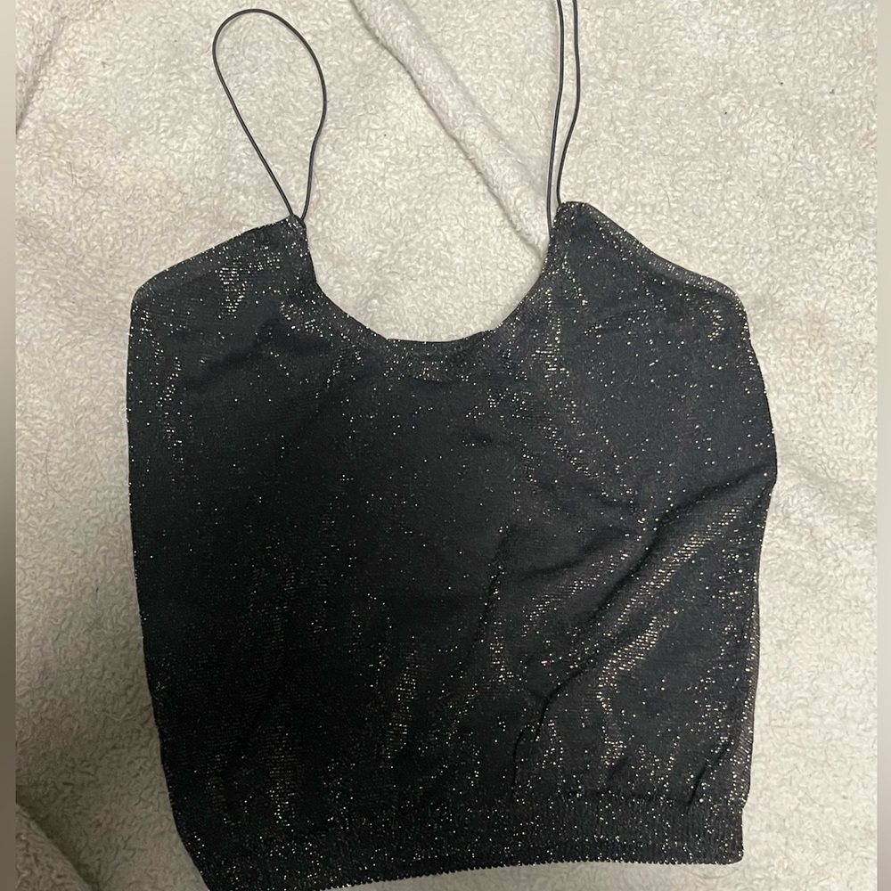 Spaghetti strap crop top! Comfortable and has gold glitter on it!